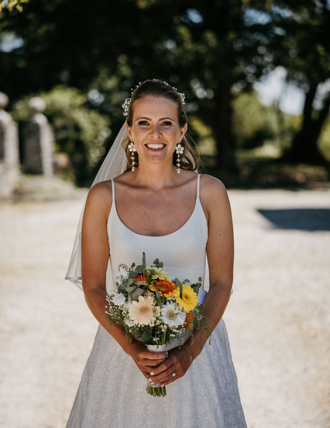 Real bride, Hermione Harbutt, brunette bride, up do, hair accessories, earrings, flores, chandelier, bespoke, nick walker photography, pearl, gold, freshwater pearl